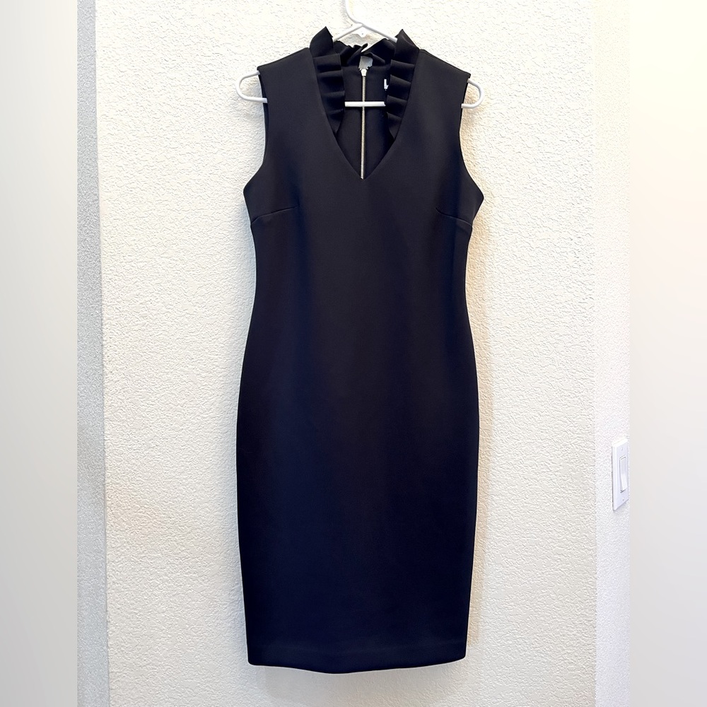 Sleek and sophisticated black, sleeveless midi Calvin Klein cocktail dress